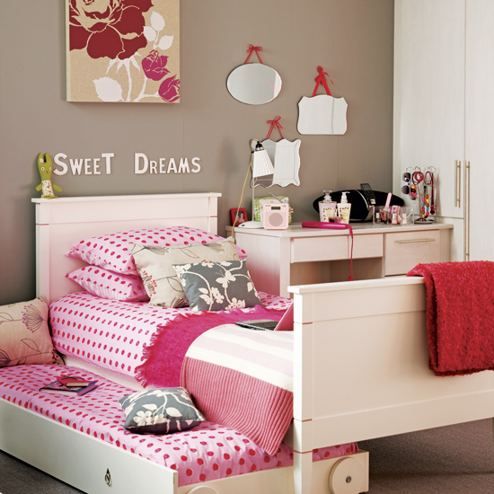 pink bedroom with under-bed trundle